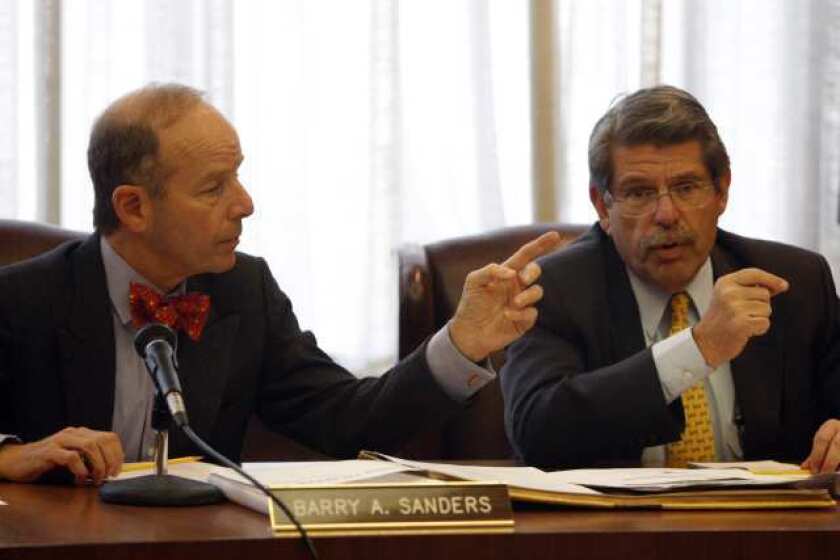 Barry Sanders and County Supervisor Zev Yaroslavsky at a meeting of the Los Angeles Memorial Coliseum Commission, which declined to continue a ban on raves at the Coliseum.