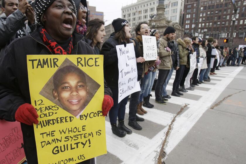 Demonstrators block Public Square in Cleveland during a protest last month over the police shooting of Tamir Rice. The 12-year-old was fatally shot by a Cleveland police officer Nov. 22 after he displayed a toy gun at a recreation center.