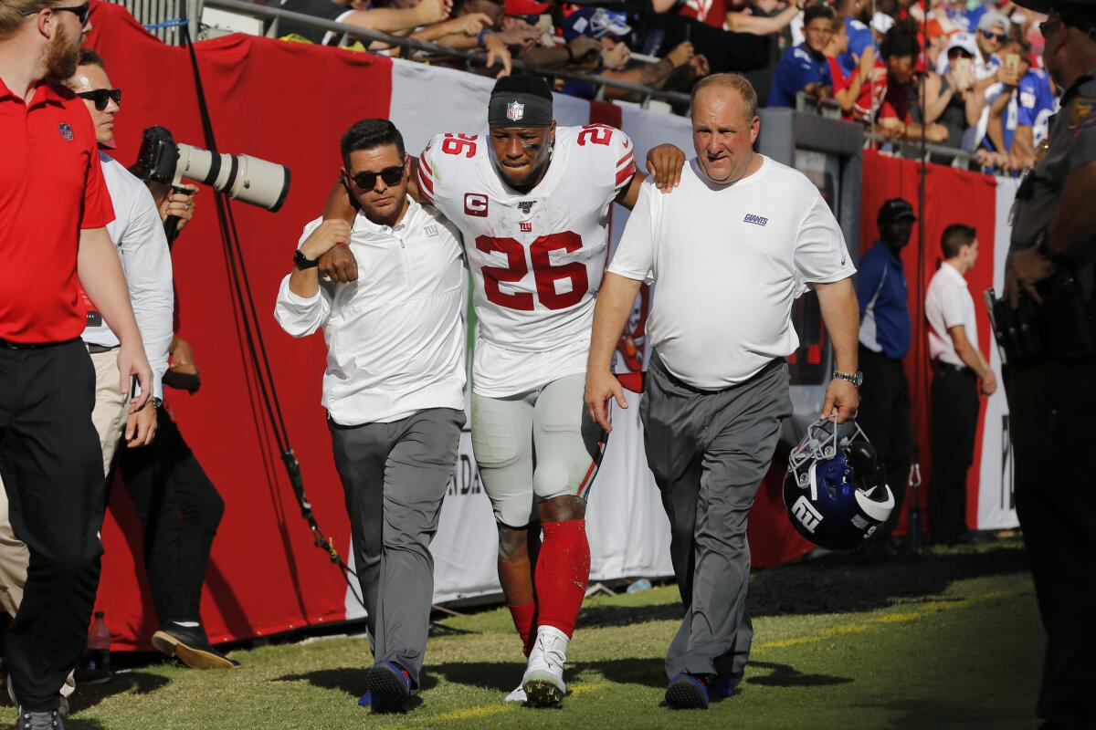 New York Giants running back Saquon Barkley says he has a high ankle sprain  - The San Diego Union-Tribune