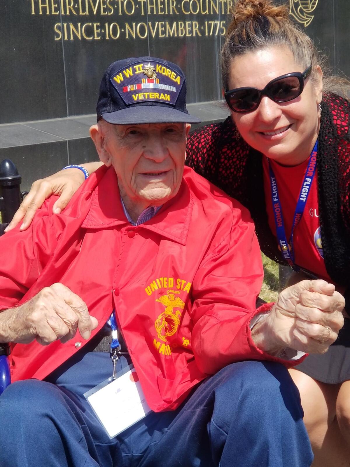 Rowe teacher Stacey Halboth with veteran WWII Pete Mayfield.