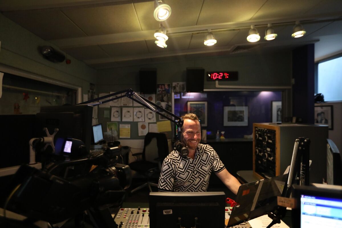 Jason Bentley, KCRW music director and host of the station's flagship music show "Morning Becomes Eclectic" at the station's old basement offices at Santa Monica City College.