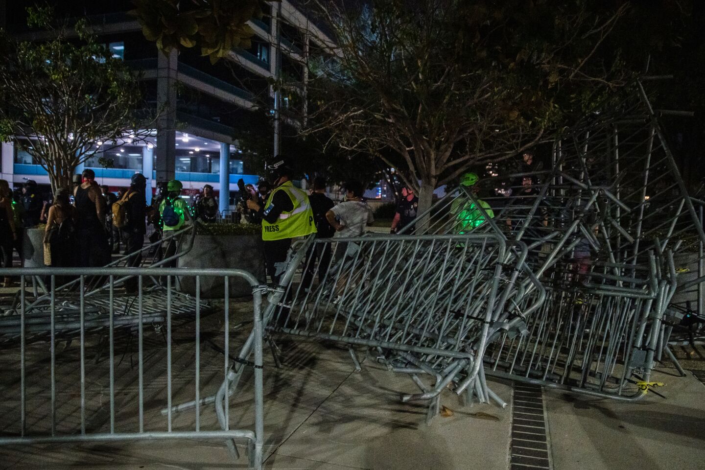 Barricades are piled on top after protesters knocked them down in front of the San Diego Police Department on September 23, 2020.