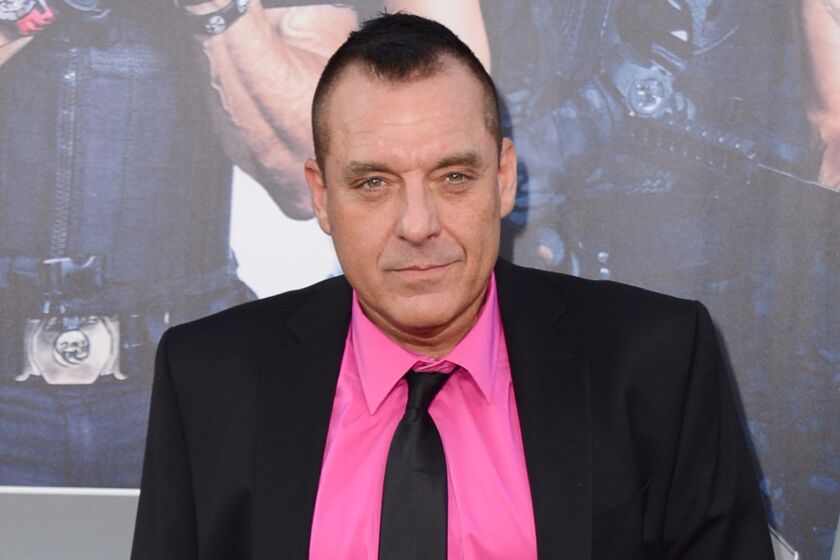 Actor Tom Sizemore, shown at the 2014 premiere of "The Expendables 3" in Los Angeles, was charged this week with three misdemeanors connected to his domestic violence arrest in July.