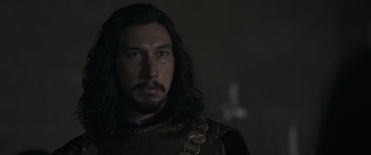 Adam Driver with a mustache and long hair in "The Last Duel."