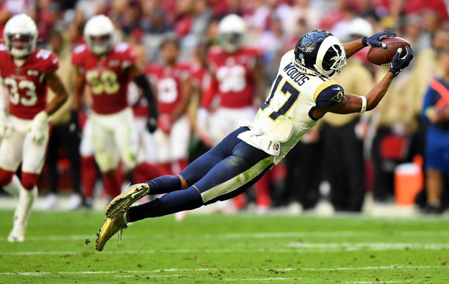 Rams wide receiver Robert Woods makes a catch against the Cardinals during the second quarter.