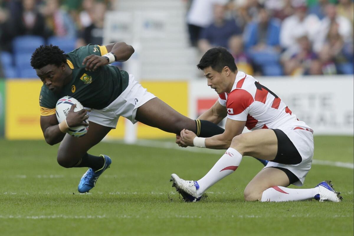 Omnigon's app for the 2015 Rugby World Cup was downloaded more than 3 million times across 204 countries, according to the company. At the event, South Africa's Lwazi Mvovo, left, is tackled by Japan's Akihito Yamada.