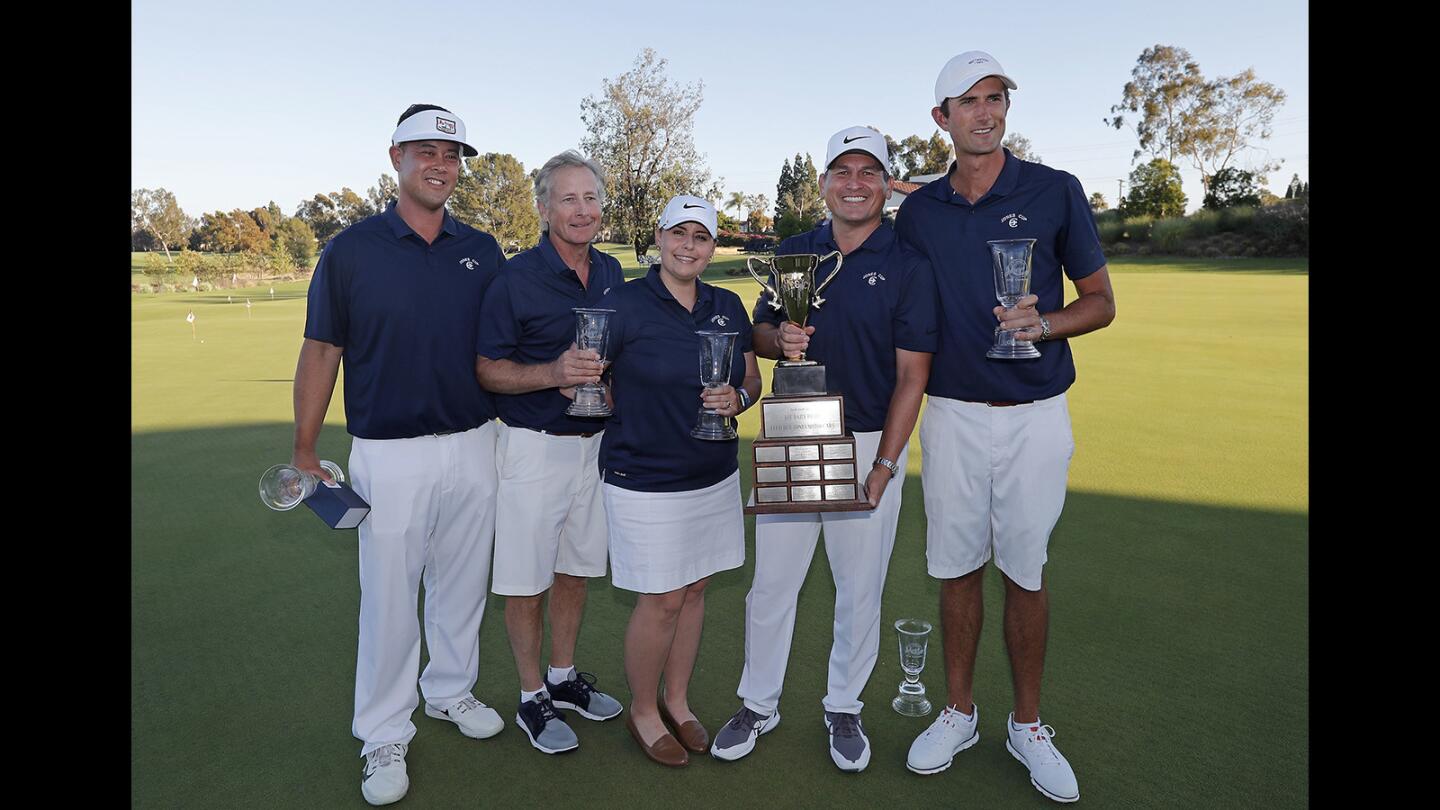 Big Canyon Country Club team members, left to right, Chris Valeriano, Todd Palmaer, Kayleigh Horn Klinzing, Robert Pang and Stewart Hagestad pose for pictures after winning the 19th annual Jones Cup at Santa Ana Country Club in Santa Ana on Tuesday, June 26.