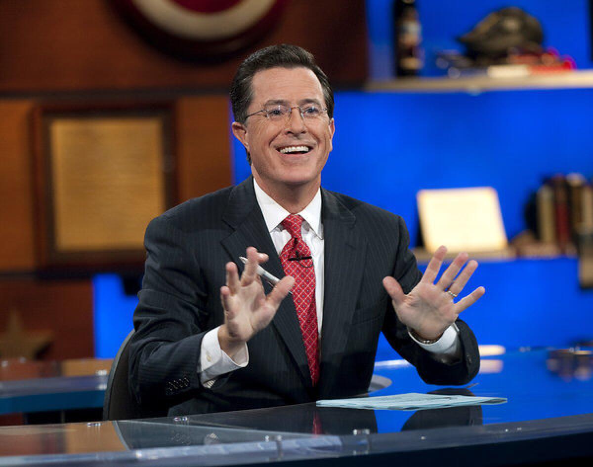 In this Sept. 8, 2010 photo released by Comedy Central, Stephen Colbert appears during "The Colbert Report," in New York.