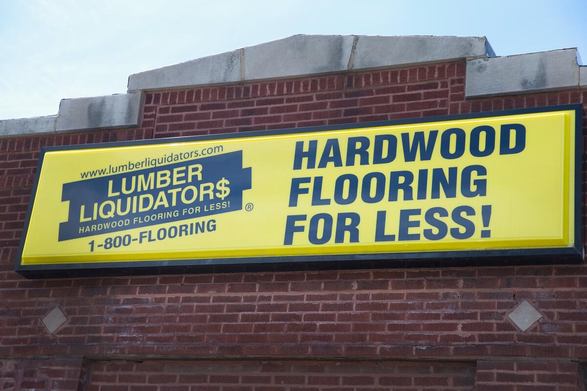 A sign hangs above the entrance a Lumber Liquidators store in Chicago.