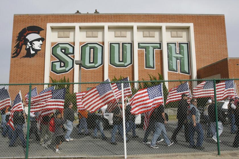 Members of the Patriot Guard Riders make their way to the football field during a public memorial service for Cpl. Joseph Anzack at South High Football Stadium in Torrance June 1, 2007. (AP Photo/Pool - REUTERS/Gus Ruelas)