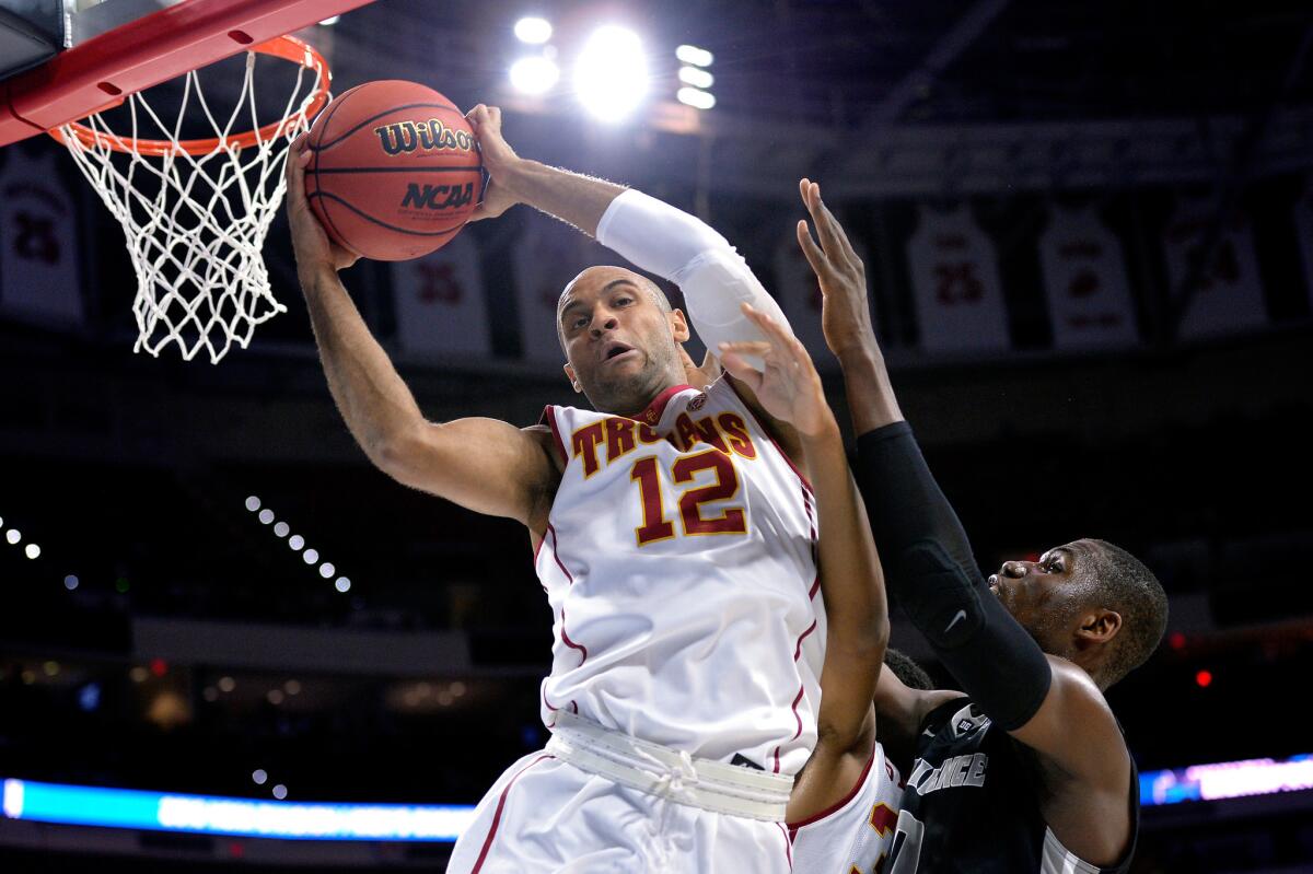 USC guard Julian Jacobs grabs a rebound against Providence forward Ben Bentil during the first half.