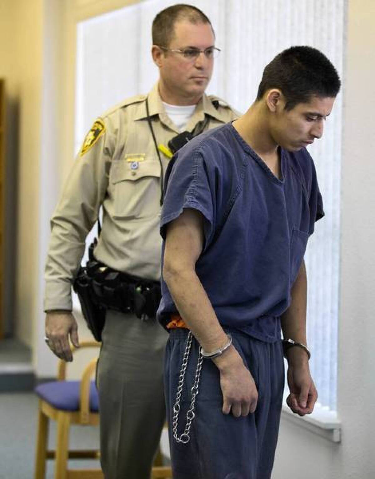 Jean Soriano, 18, right, had been charged with multiple counts of felony drunk driving, but prosecutors dropped the charges after learning he was not the driver of an SUV that rear-ended a van on Interstate 15 about 80 miles northeast of Las Vegas and killed five people in March.