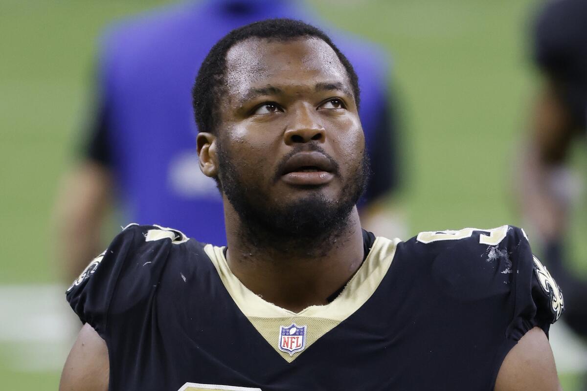 FILE - New Orleans Saints defensive tackle David Onyemata is shown after an NFL football game against the Atlanta Falcons in New Orleans, in this Sunday, Nov. 22, 2020, file photo. Saints starting defensive tackle David Onyemata has been been notified by the NFL he has tested positive for a banned substance and likely is facing a suspension, the player said in a social media post Friday morning, July 16, 2021. (AP Photo/Tyler Kaufman, File)