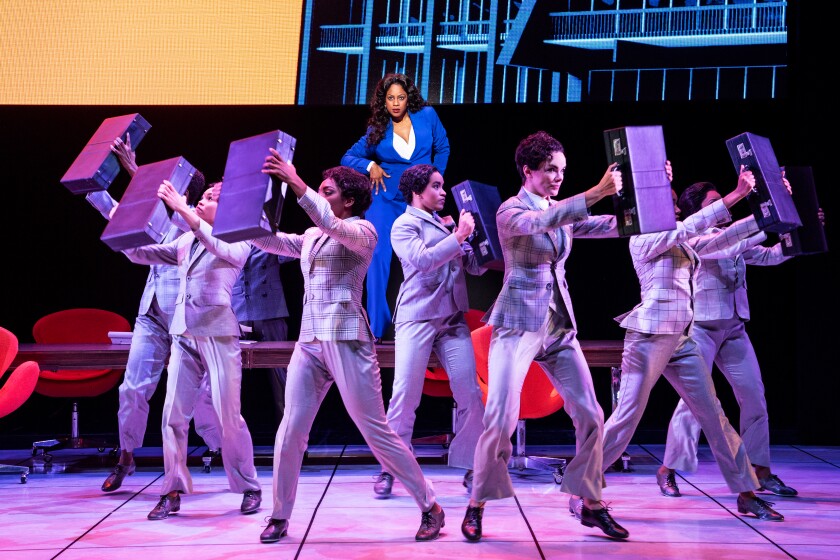 The glorious days of disco celebrated with double-breasted suits and briefcases in "Summer."