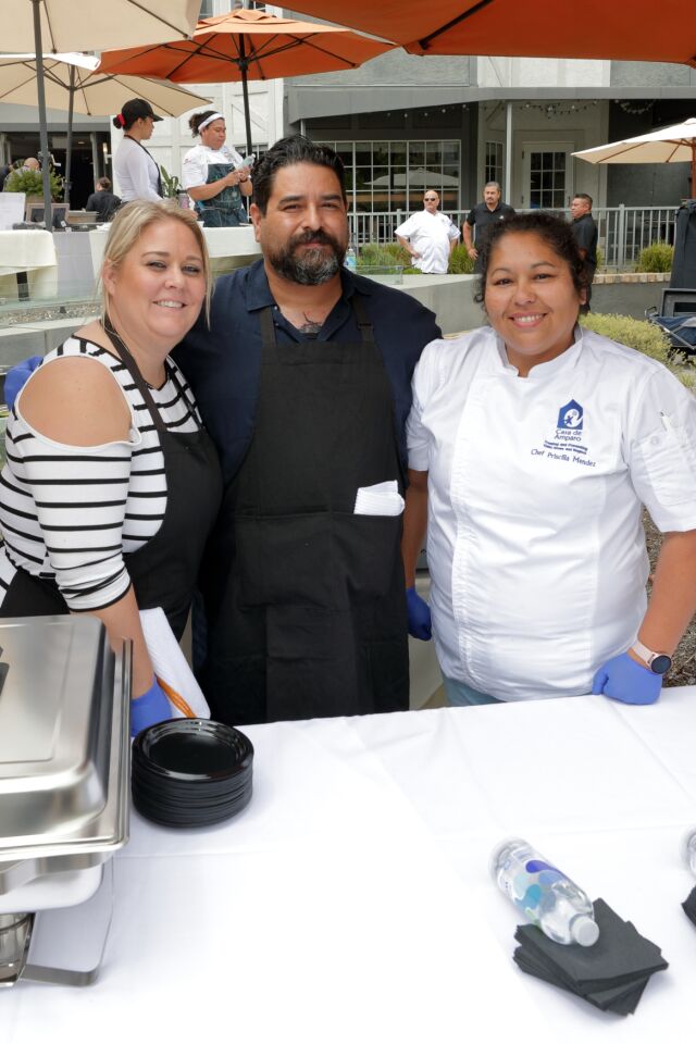 Nicole Rojas, Bobby Rojas, and Chef Priscilla Mendez from Casa de Amparo Kitchen