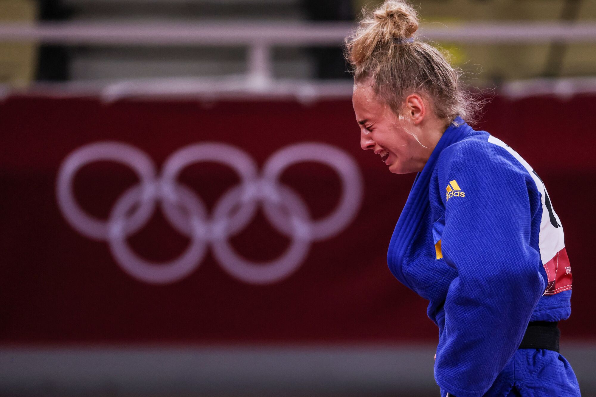 Ukraine's Daria Bilodid weeps after defeating Israel's Shira Rishony  