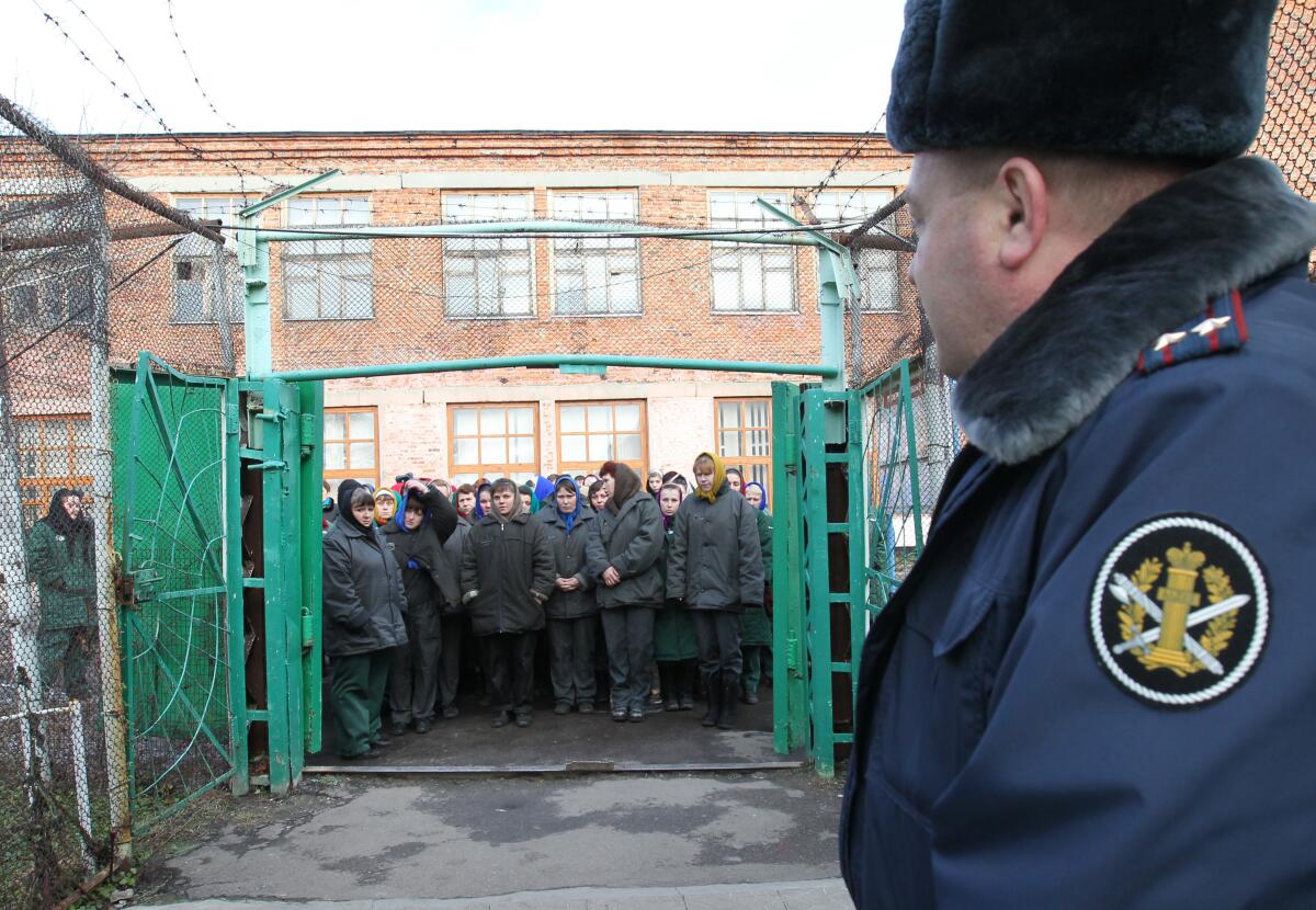Imprisoned women wait to be escorted to work at a Russian penal colony in Orel, Russia, in November 2011.