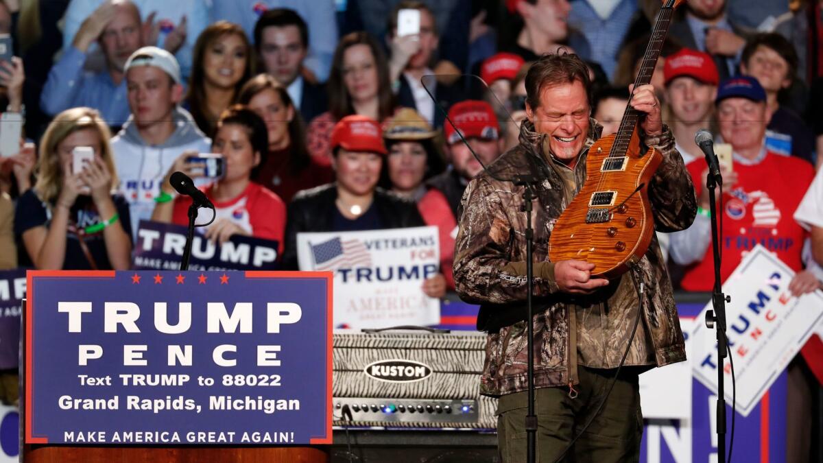 Ted Nugent performs at a campaign rally for Donald Trump in Grand Rapids, Mich., on Nov. 7.
