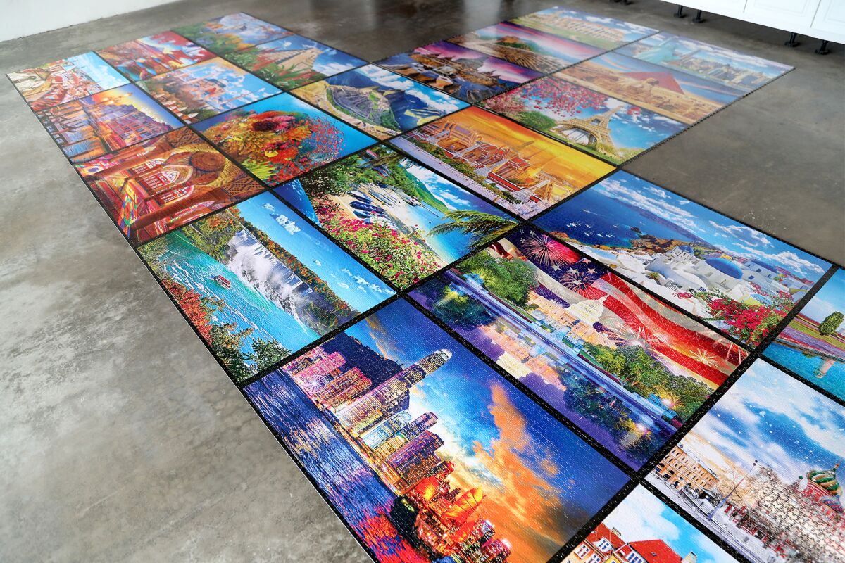 St. Sure completed a Kodak World's Largest Puzzle that includes 51,300 pieces.