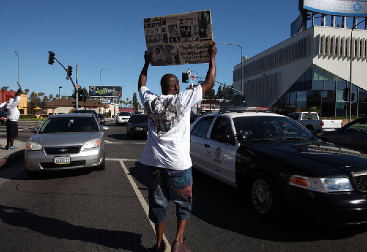 Protesters gathered at Leimert Park on Tuesday afternoon to protest the verdict in the George Zimmerman trial.