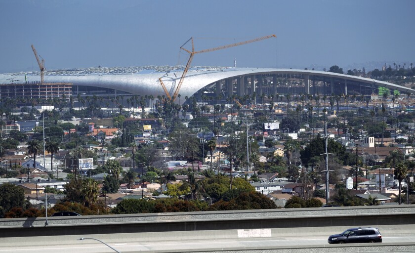Freeway traffic passes in front of SoFi Stadium on March 4. 