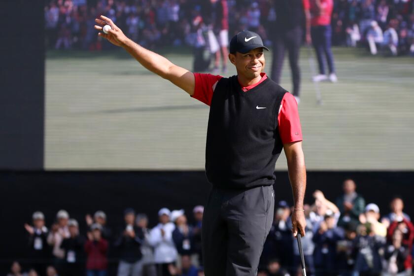 INZAI, JAPAN - OCTOBER 28: Tiger Woods of the United States celebrates winning the tournament on the 18th green during the final round of the Zozo Championship at Accordia Golf Narashino Country Club on October 28, 2019 in Inzai, Chiba, Japan. (Photo by Chung Sung-Jun/Getty Images)