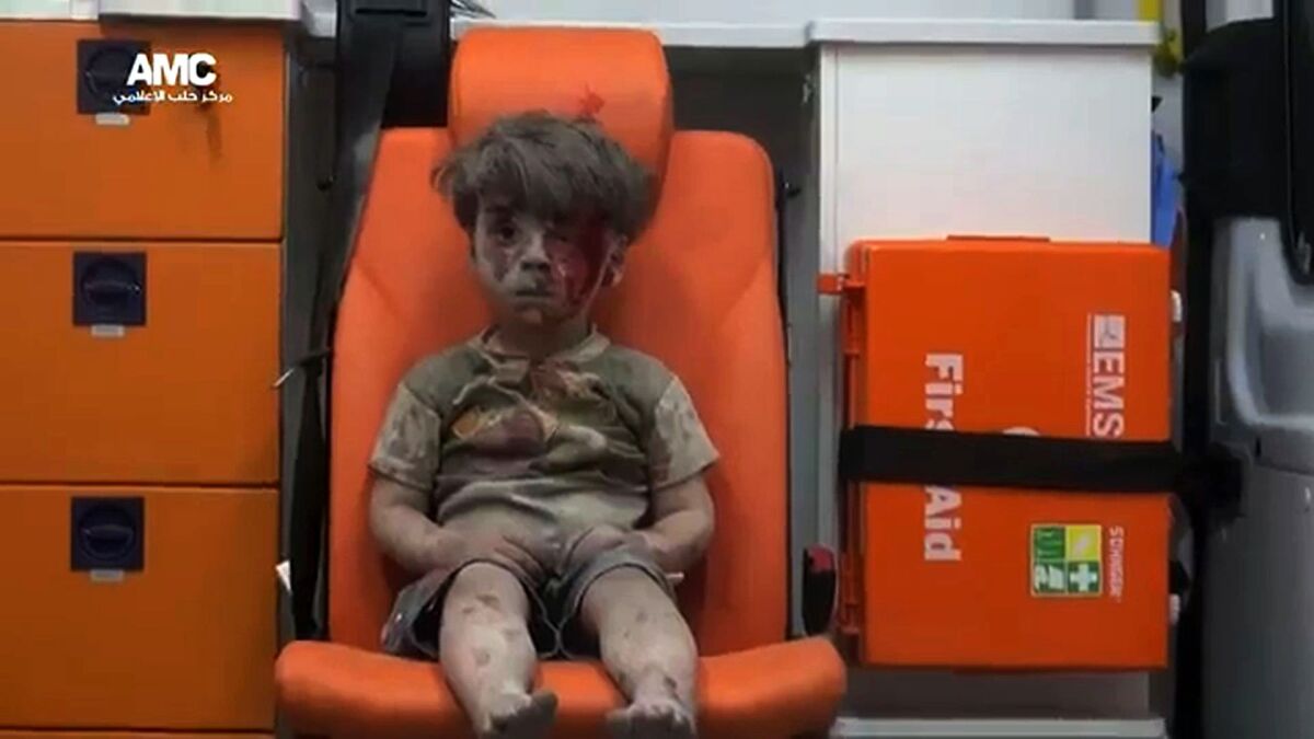 An injured boy sits alone in an ambulance after an attack in Aleppo in an image from video posted by a Syrian opposition group on Aug. 17, 2016.