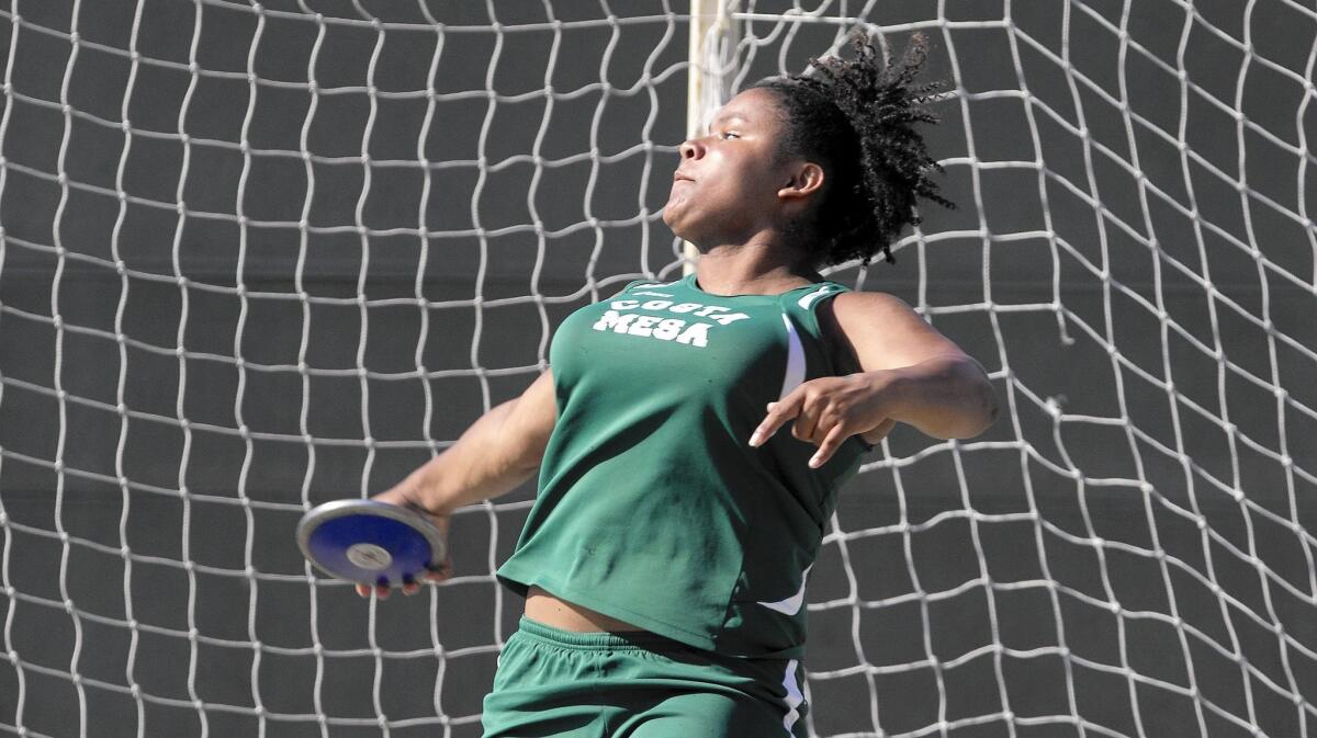 NORWALK, CA, May 27, 2016 -- Costa Mesa High's Felicia Crenshaw qualifies on her second throw in the girls discus during the 2016 CIF Southern Section Track & Field Masters Meet at Cerritos College in Norwalk on Friday. (Kevin Chang/ Daily Pilot)