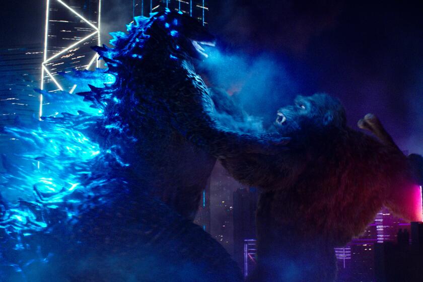 (L-r) GODZILLA battles KONG in Warner Bros. Pictures' and Legendary Pictures' action adventure "GODZILLA VS. KONG," a Warner Bros. Pictures and Legendary Pictures release. Credit: Warner Bros. Pictures and Legendary Pictures