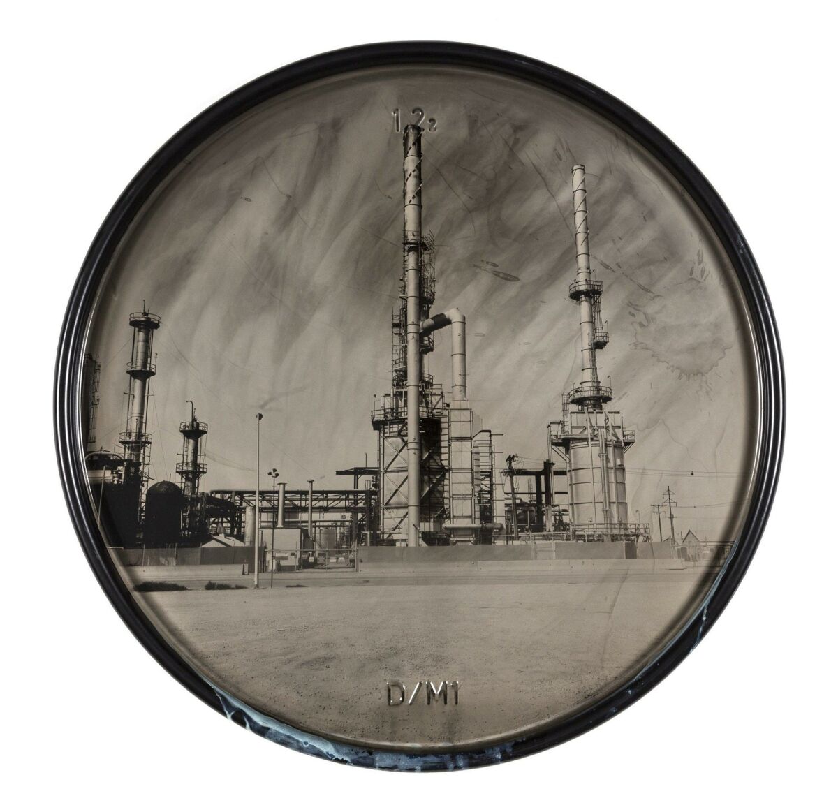 David Emitt Adams: “Navajo Refinery, Artesia, New Mexico” (2015, wet plate collodion tintype on 55-gallon oil drum lid) Courtesy of David Emitt Adams