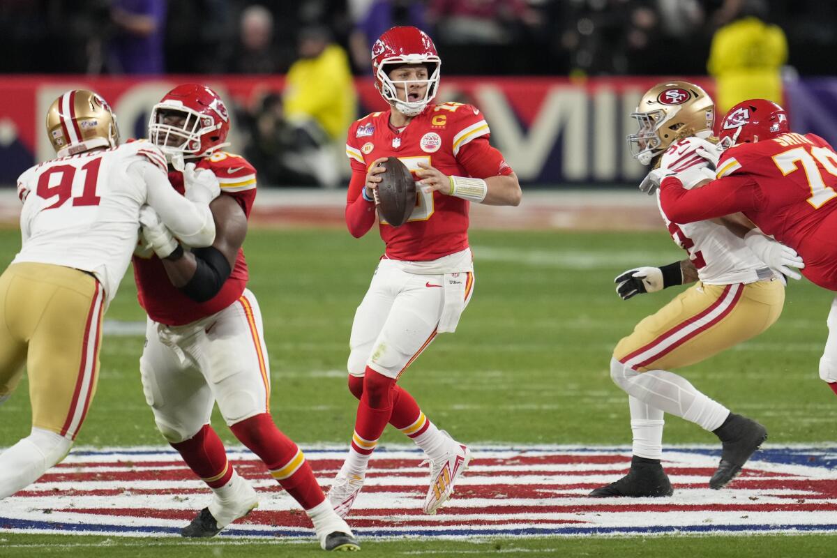 Kansas City Chiefs quarterback Patrick Mahomes looks to pass against the San Francisco 49ers in the second quarter.
