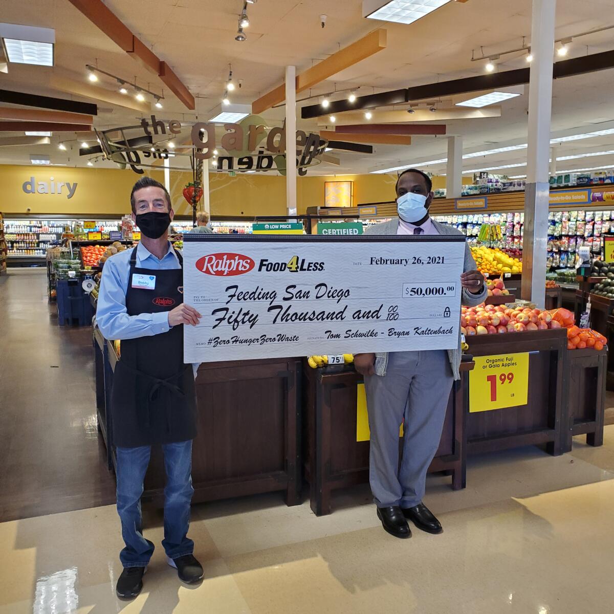 Maron Dean, store leader at the Encinitas Ralphs, presented the $50,000 check to Feeding San Diego.