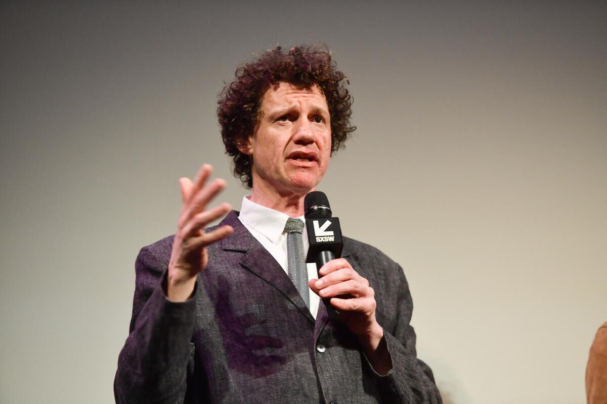 Chris Morris talking to the audience at the SXSW premiere of his film "The Day Shall Come."