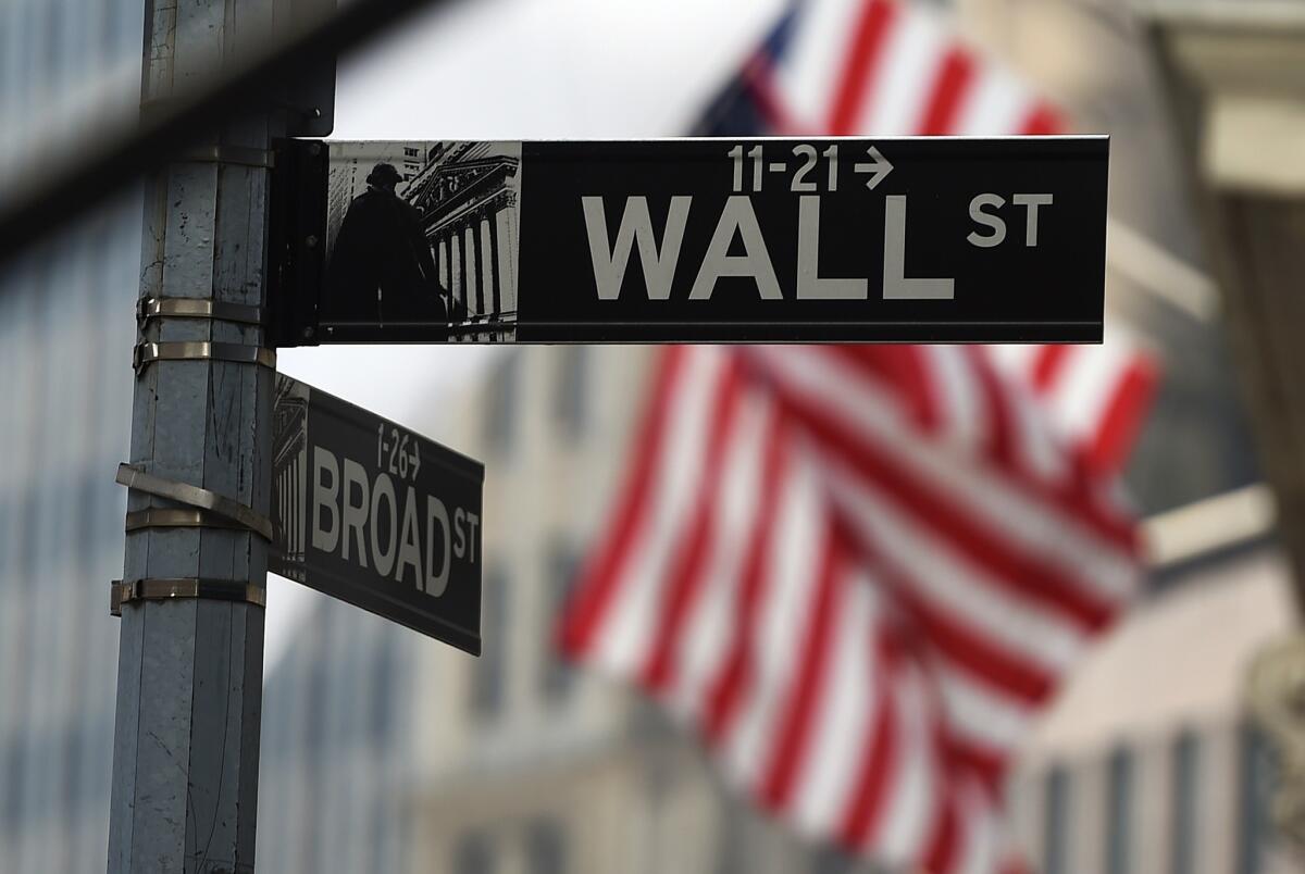 A Wall Street road sign near the New York Stock Exchange building in New York.