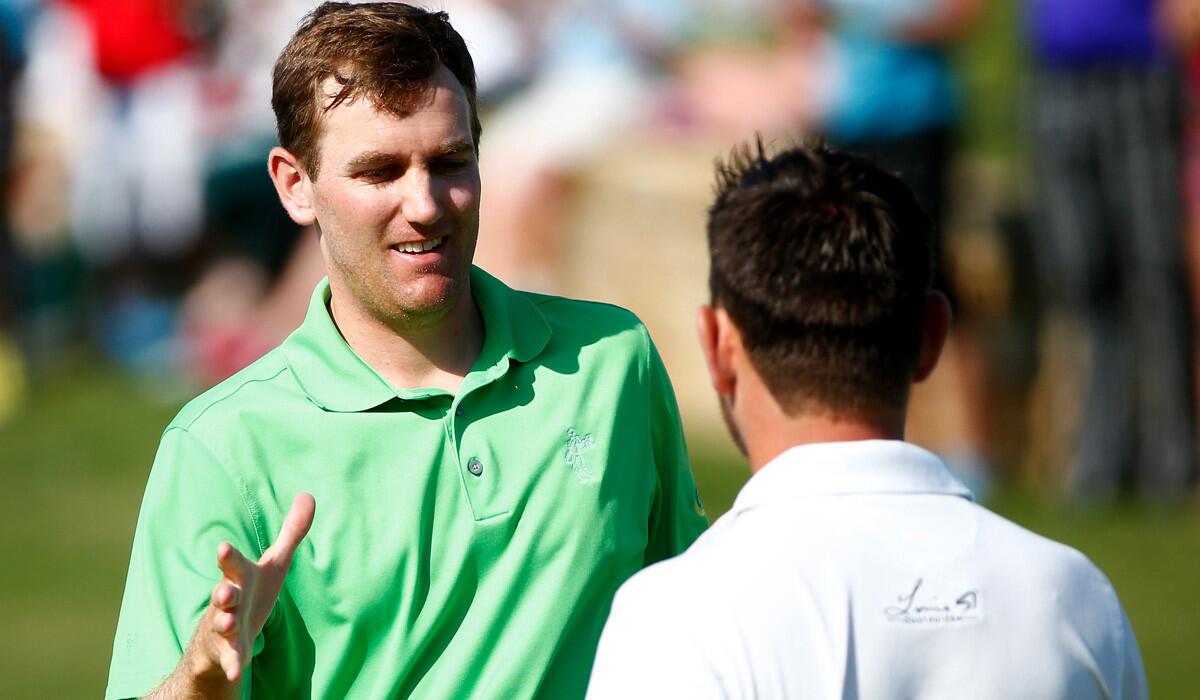 Brendon Todd is congratulated by Louis Oosthuizen after winning the Byron Nelson Championship on Sunday.