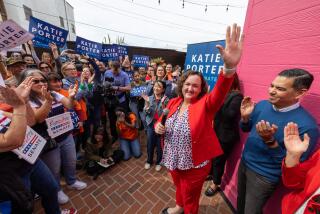 Long Beach, CA - February 17: Rep. Katie Porter, who is running for the late Dianne Feinstein's Senate seat, waves to supporters at a campaign event at Lola's Mexican Cuisine on Saturday, Feb. 17, 2024 in Long Beach, CA. (Brian van der Brug / Los Angeles Times)