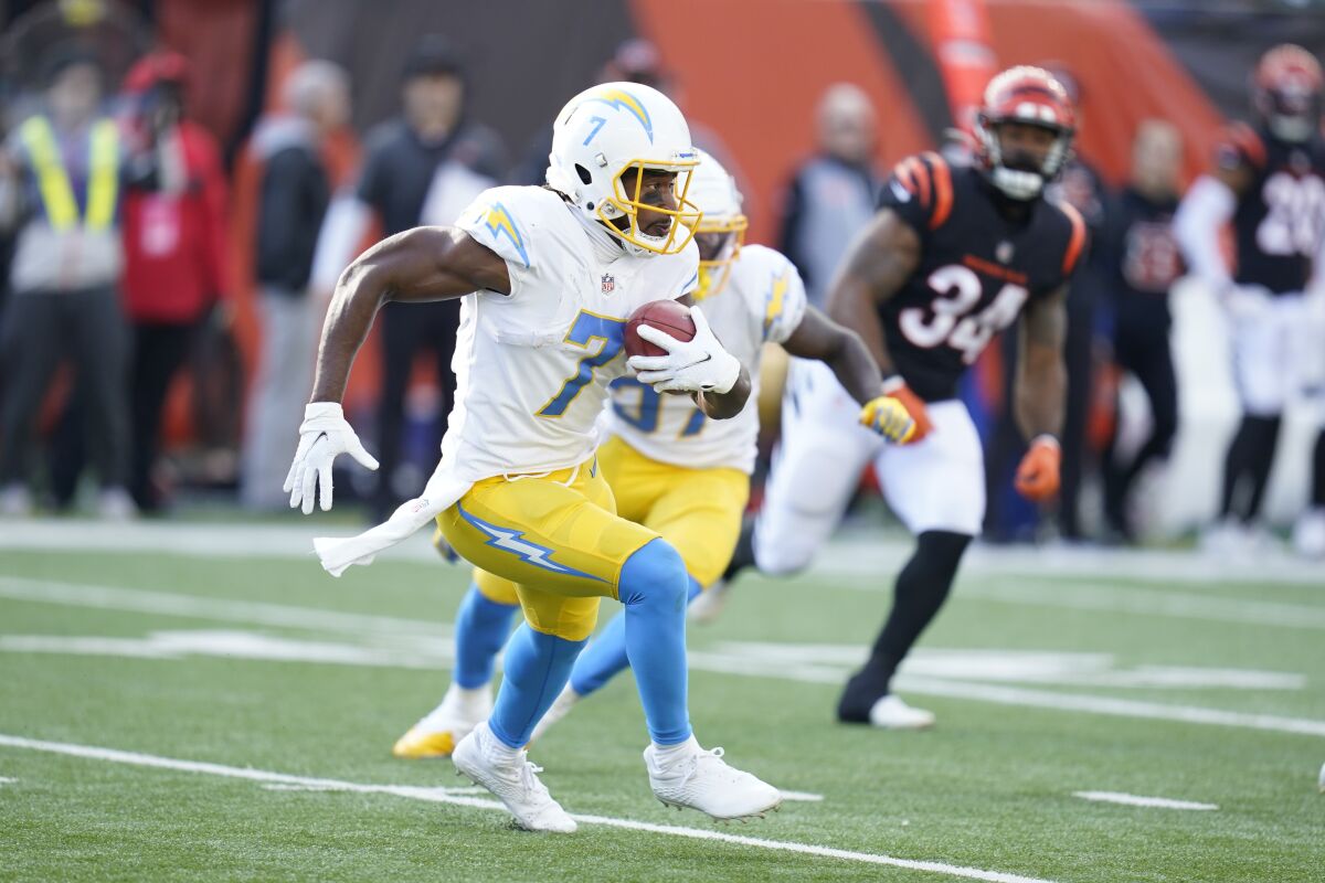 Chargers returner Andre Roberts (7) finds running room against the Bengals.