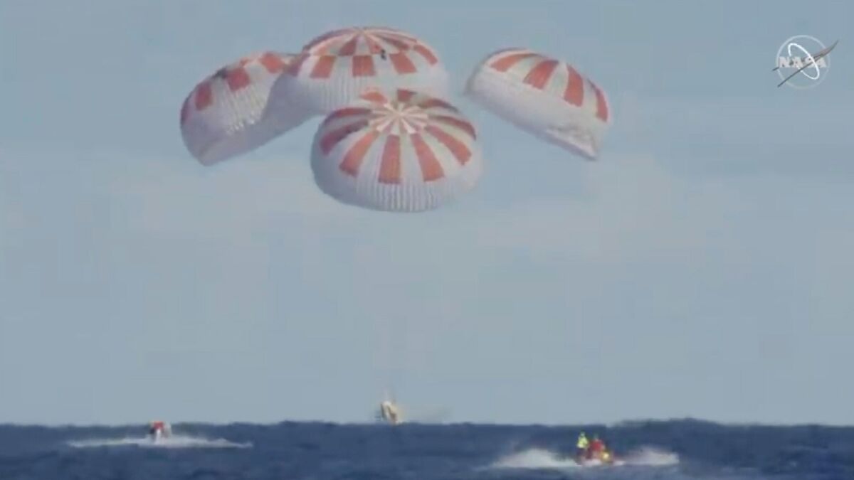 SpaceX's Crew Dragon capsule splashes down