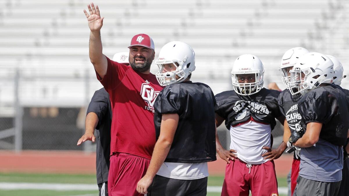 Ocean View High football coach Luis Nuñez, shown during a practice in 2018, is hopeful that the season will begin on time this fall.