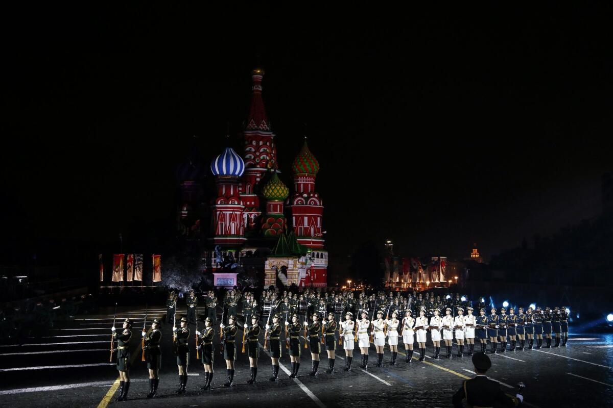 The band of the People's Liberation Army (PLA) of China performs during the International Military Music Festival 'Spasskaya Tower' on Moscow's Red Square, Russia, 09 September 2015. T