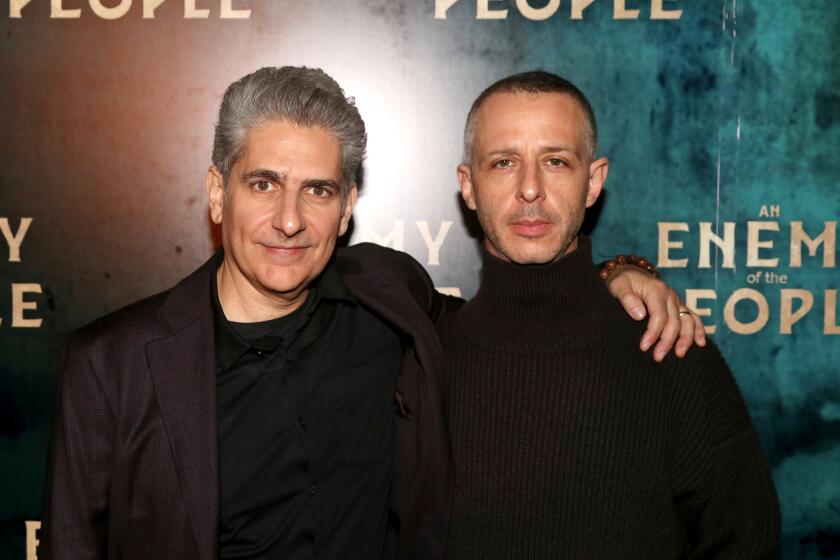 Michael Imperioli and Jeremy Strong pose in black at "An Enemy of the People" press event