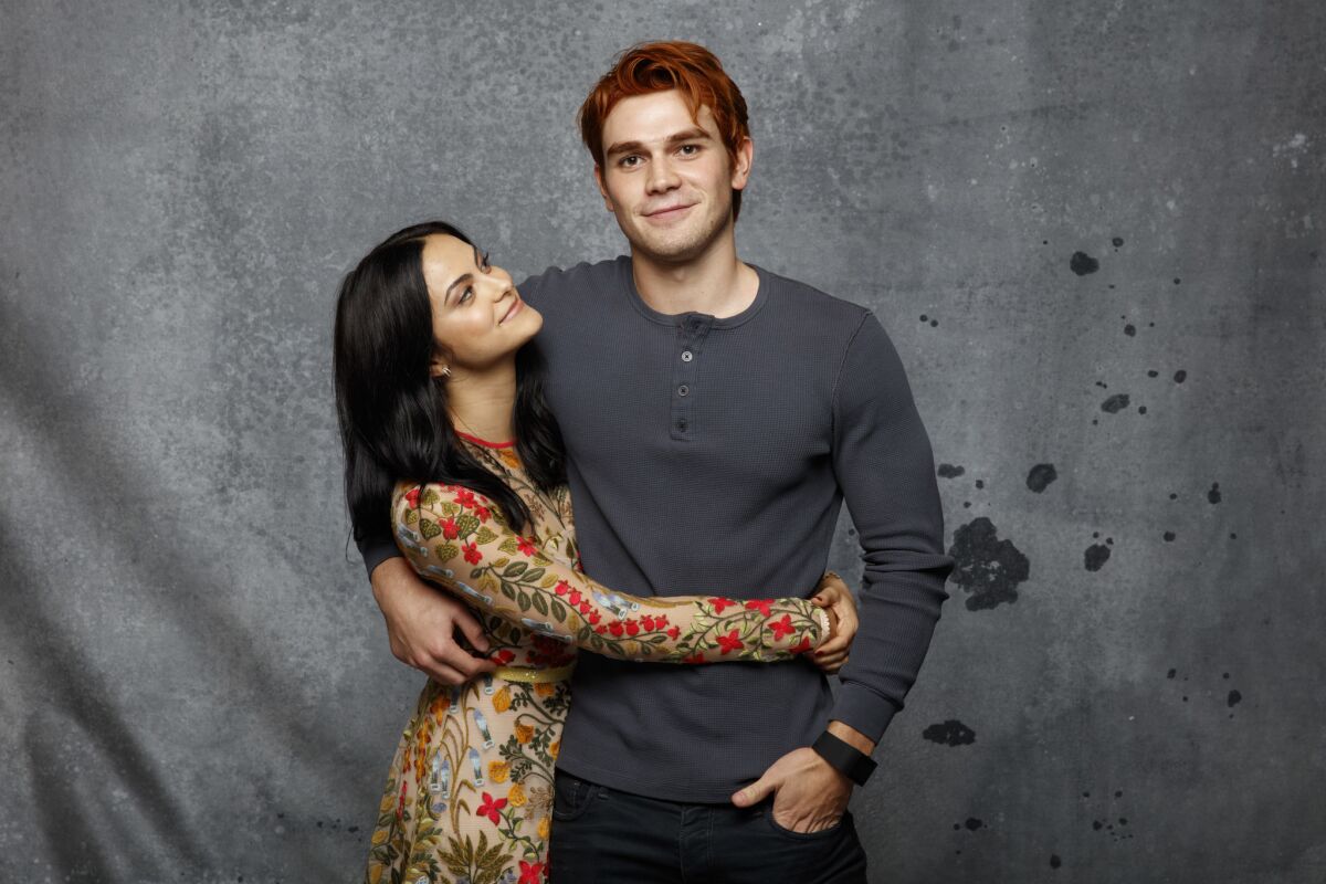 "Riverdale"'s Camila Mendes and KJ Apa at Comic-Con 2017 — click for more photos from the Los Angeles Times studio