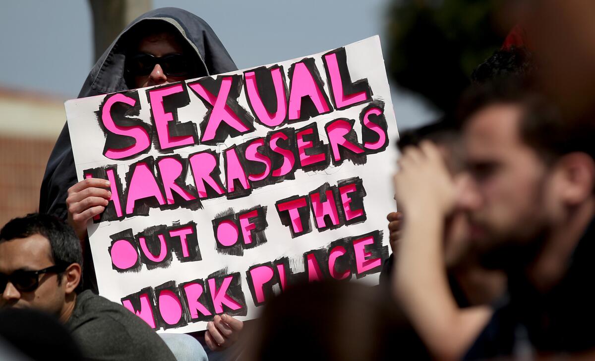 Students and other members of the UCLA community gather on the Westwood campus to protest the university's handling of sexual harassment complaints made against history professor Gabriel Piterberg.