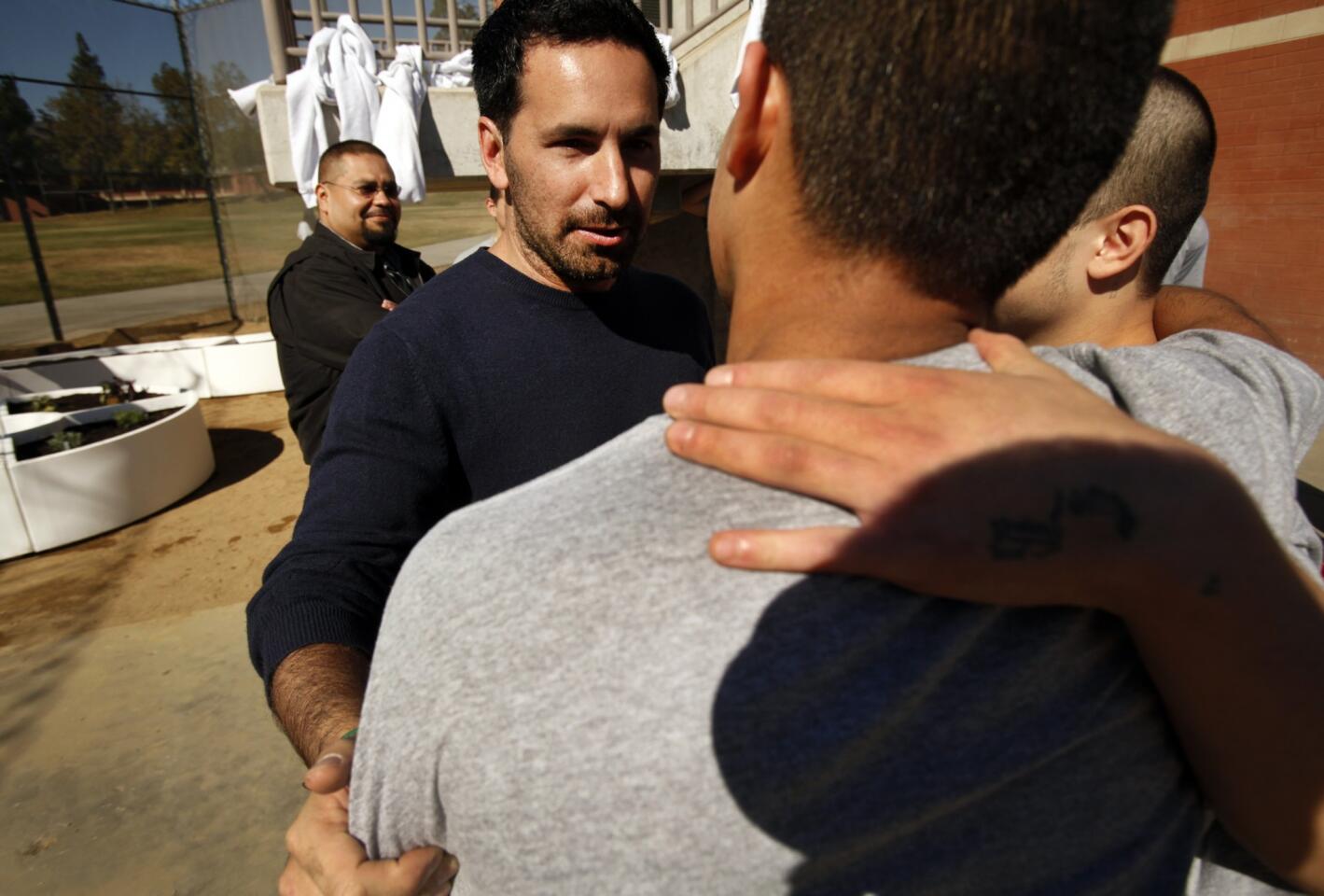 Scott Budnick, left, producer of the "Hangover" movies, chats with youths at the Barry J. Nidorf Juvenile Hall in Sylmar. Budnick, who is passionate about social justice issues, became involved with InsideOut Writers, a volunteer creative-writing program in the county's juvenile halls.