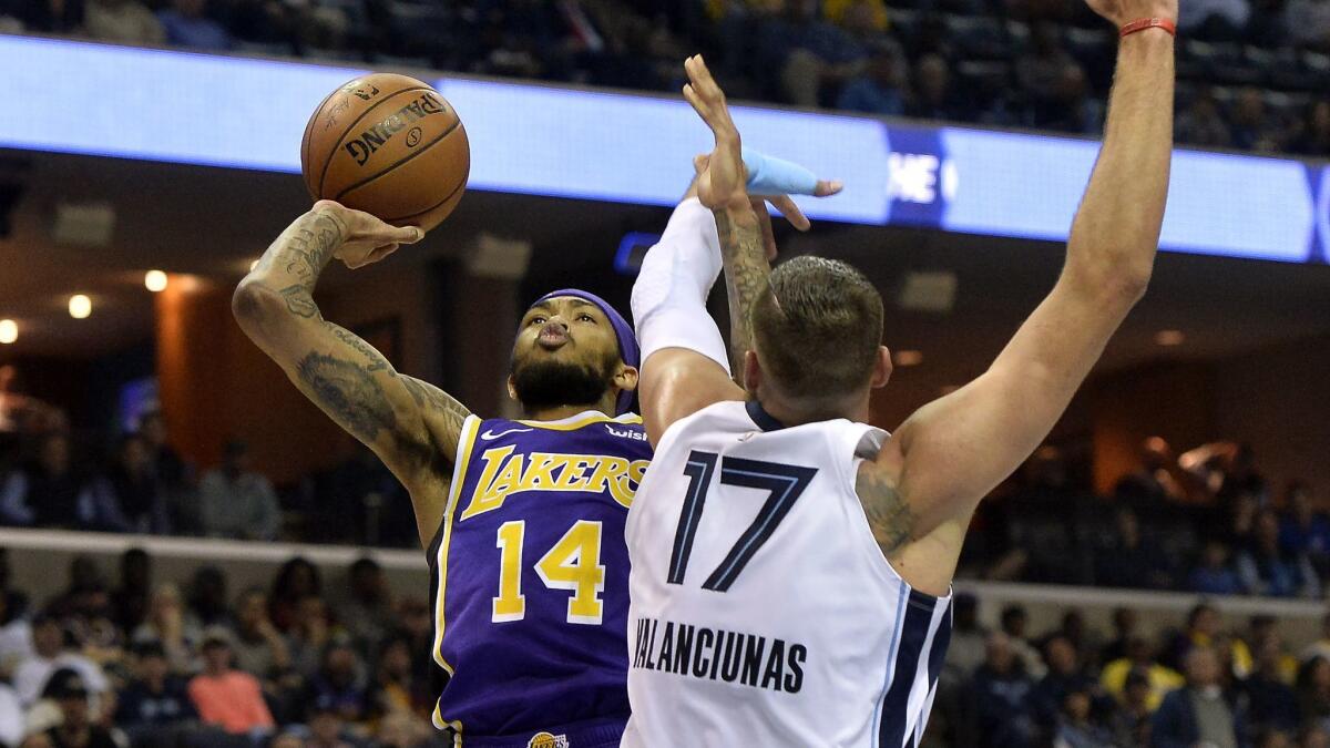 Lakers forward Brandon Ingram shoots against Memphis center Jonas Valanciunas on Feb. 25.