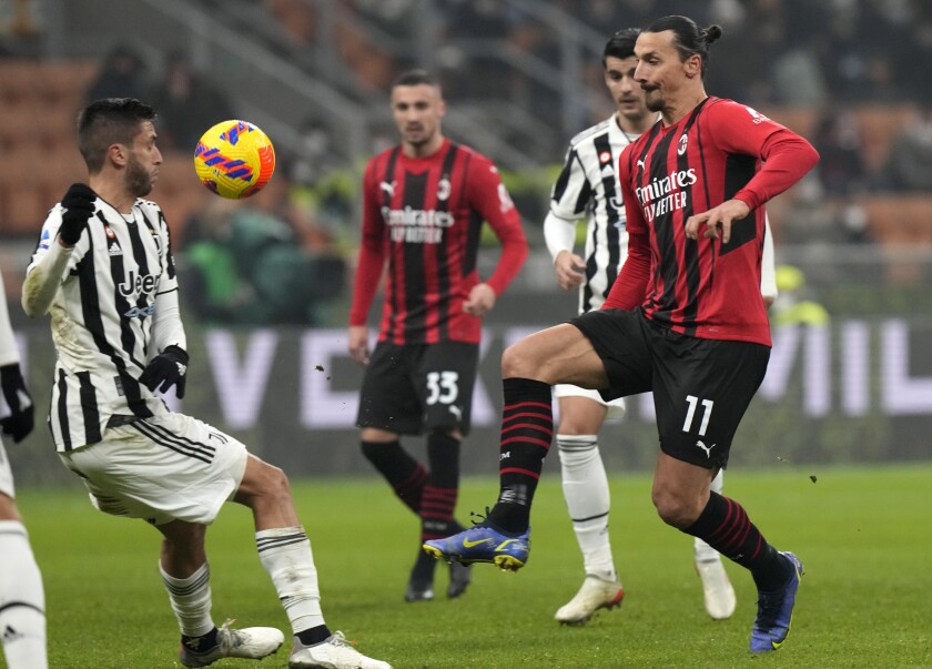 AC Milan's Zlatan Ibrahimovic kicks the ball during a Serie A soccer match between AC Milan and Juventus at the San Siro stadium in Milan, Italy, Sunday, Jan. 23, 2022. (AP Photo/Luca Bruno)