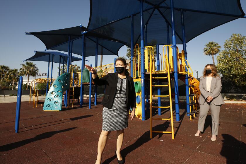 GLENDALE, CA - MAY 26: Principal Perla Chavez-Fritz, left, of Cerritos Elementary in Glendale and Los Angeles County Office of Education Supt. Debra Duardo, right, tour of Cerritos Elementary in Glendale on Tuesday May 26, 2020 considering that with a persisting coronavirus threat, K-12 campuses will try to reopen in the fall. New L.A. County guidelines offer a possible roadmap but it could get complicated and costly to confront the logistics of reopening at an actual school in the wake of Covid-19. Glendale on Tuesday, May 26, 2020 in Glendale, CA. (Al Seib / Los Angeles Times)