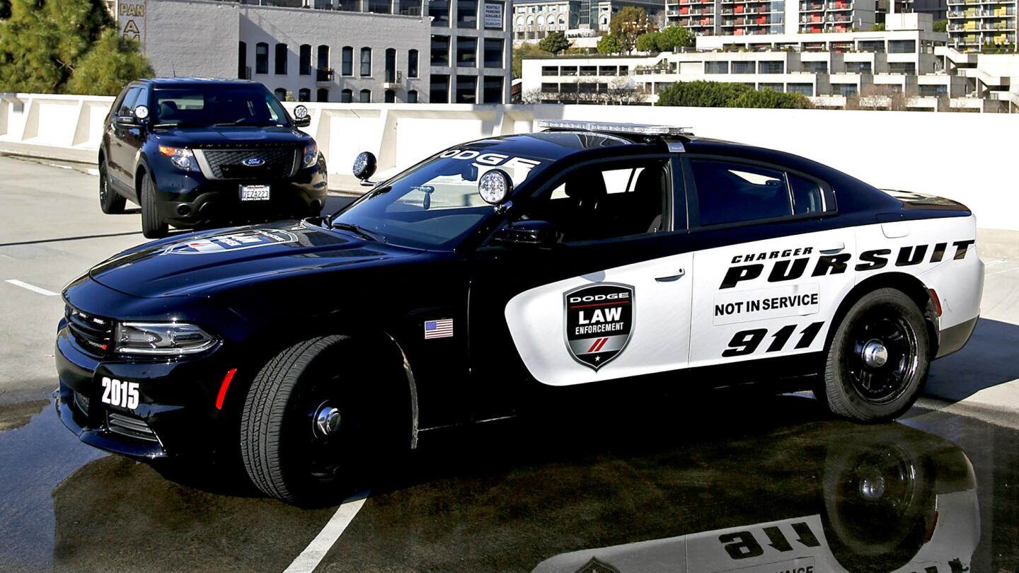 New Dodge Charger and Ford Interceptor Utility police cars.