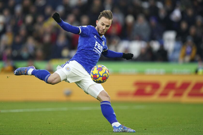 Leicester City's James Maddison scores his side's first goal during the English Premier League soccer match between Watford and Leicester City at the King Power Stadium, Watford, England, Sunday, Nov. 28, 2021. (Tim Goode/PA via AP)