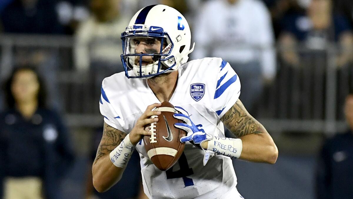 Memphis quarterback Riley Ferguson looks downfield for a receiver during the game against Connecticut on Friday.